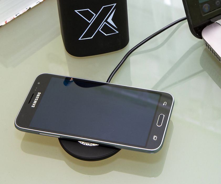 Mobile phone place onto the Wireless QI charger pad