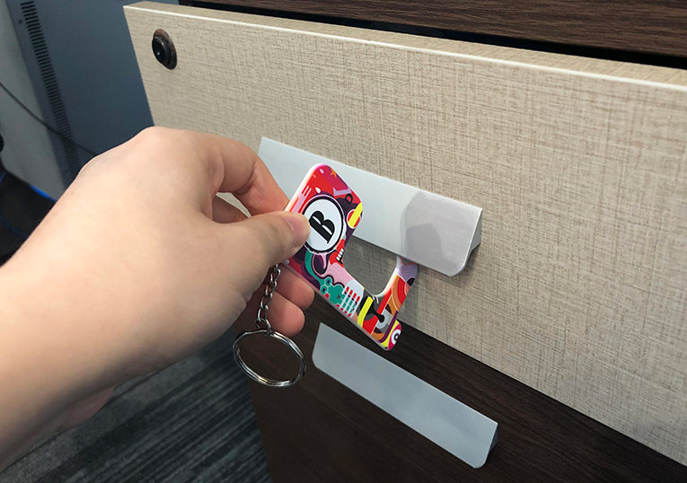 Opening a drawer with a polymer germ free keyring